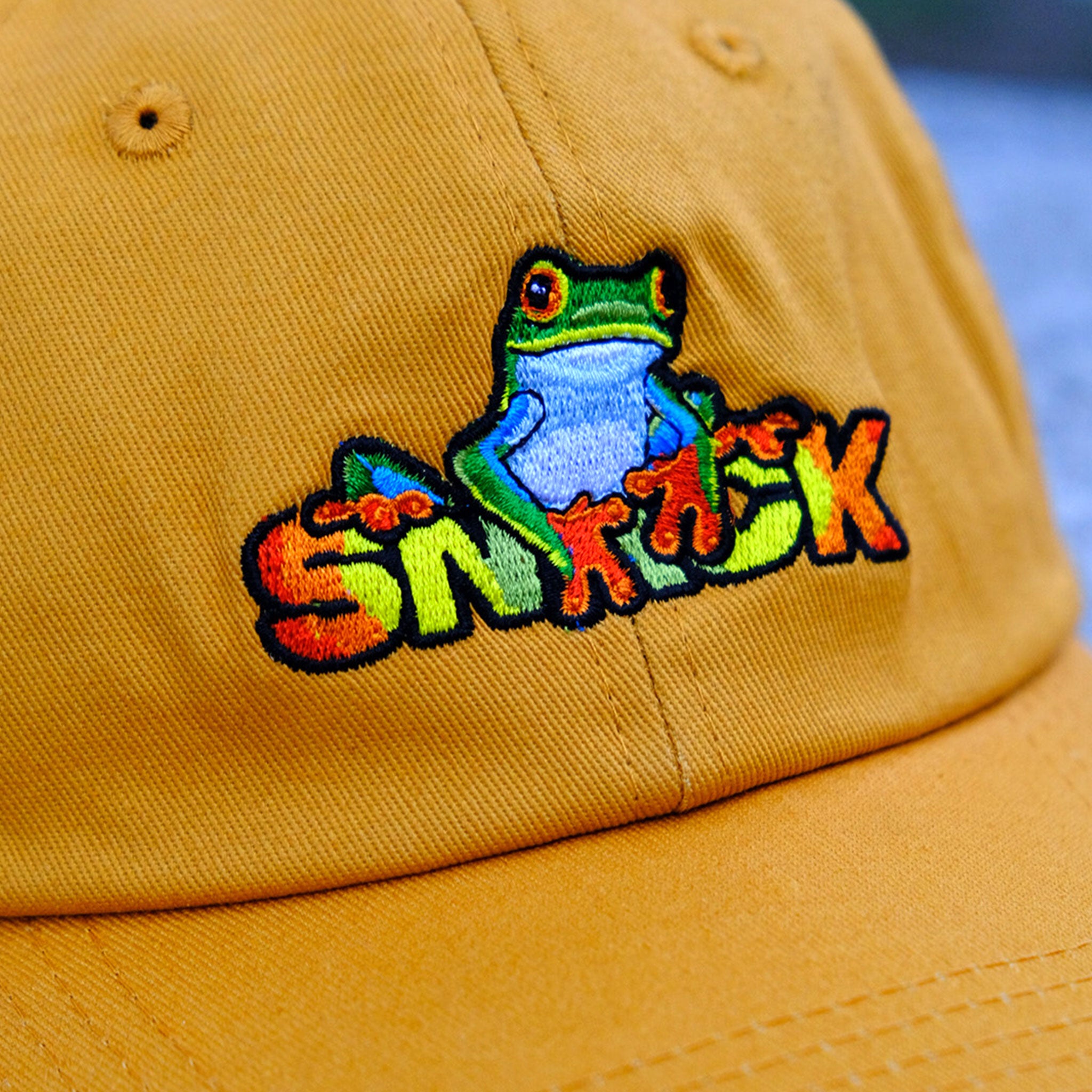 Snack Skateboarding Poisonous Darts cappello oro tela